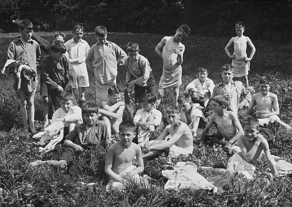 Boys Club, swimming and relaxing by river, 1927