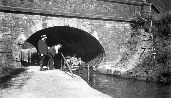 Edwardian canal scene with rowing boat
