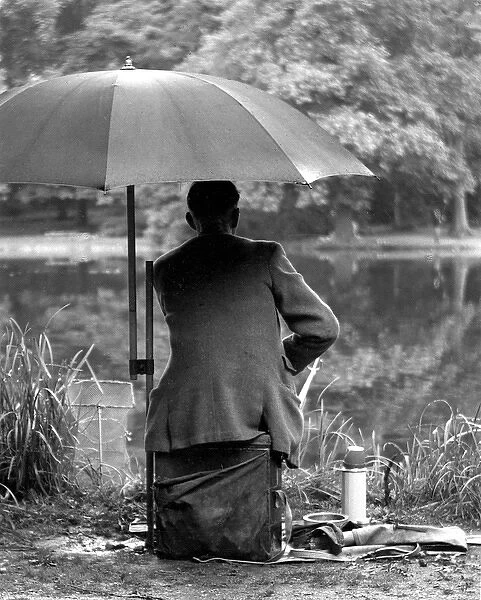 Fishing in the rain Wanstead Park, East London