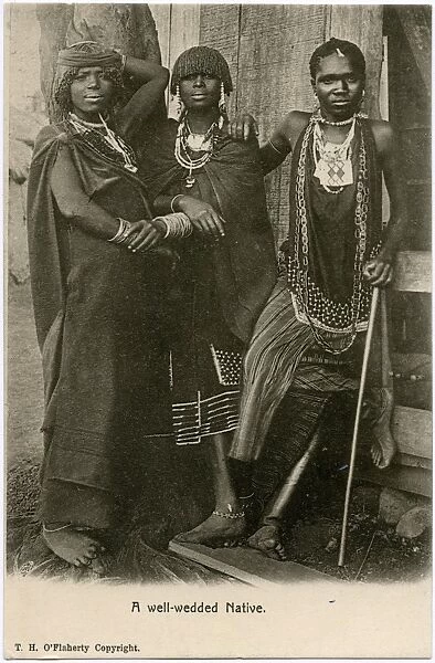Kenya, East Africa - Man with his two wives