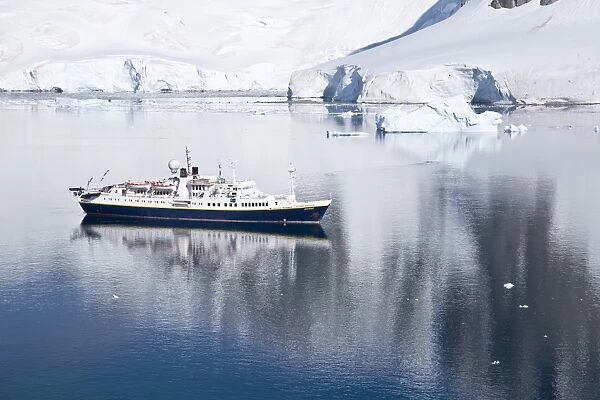 The Lindblad Expedition ship National Geographic Endeavour operating in and around the Antarctic peninsula in Antarctica. Lindblad Expeditions pioneered expedition travel for non-scientists to Antarctica in 1969 and continues as one of the premier