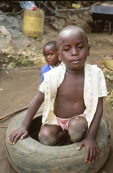 A poor child in Mombassa in Kenya. Africas poorest peple will suffer greatest from the impacts of climate