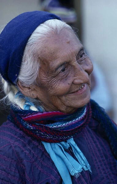 MEXICO, Oaxaca, Juchitan Matriarchal society. Head and shoulders portrait of elderly