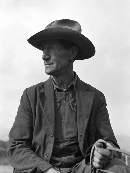 IDAHO: FARMER, 1939. Ex-Nebraska farmer developing a farm out of the stumps in Bonner County
