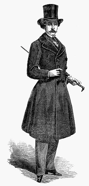 MENs FASHION, 1852. A fashionable gentleman in his overcoat. Wood engraving, English, 1852