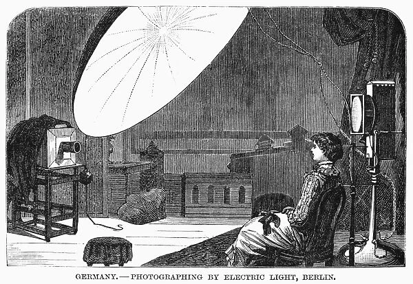 PHOTOGRAPHIC LIGHTING. Photographing by electric light, Berlin, Germany. Line engraving, 1881