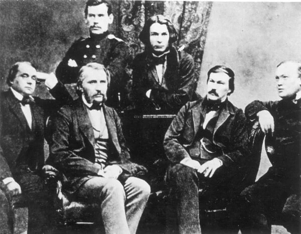 Russian novelist. Goncharov, far left, with fellow writers (left to right): Ivan Turgenev, Alexander Druzhinin, and Alexander Ostrovsky. Standing are Leo Tolstoy (in uniform) and Dmitri Grigorovich