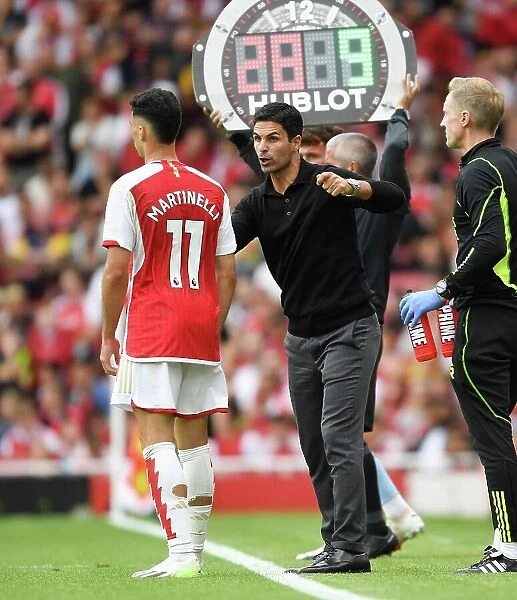 Arsenal Manager Mikel Arteta Conferencing with Gabriel Martinelli during Arsenal vs Nottingham Forest (2023-24)