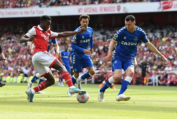 Arsenal's Eddie Nketiah Clashes with Everton's Michael Keane in Intense Premier League Showdown