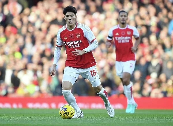 Arsenal's Tomiyasu Charges Forward Against Burnley in Premier League Showdown (2023-24)