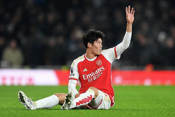Arsenal's Tomiyasu Suffers Injury in Arsenal v Wolverhampton Wanderers Premier League Clash (2023-24)