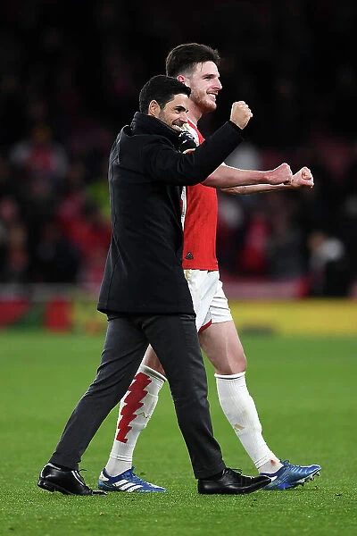 Arsenal's Victory: Mikel Arteta Celebrates with Declan Rice against Burnley in the 2023-24 Premier League