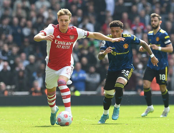 Clash of Talents: Arsenal's Odegaard vs Man Utd's Sancho in Premier League Showdown