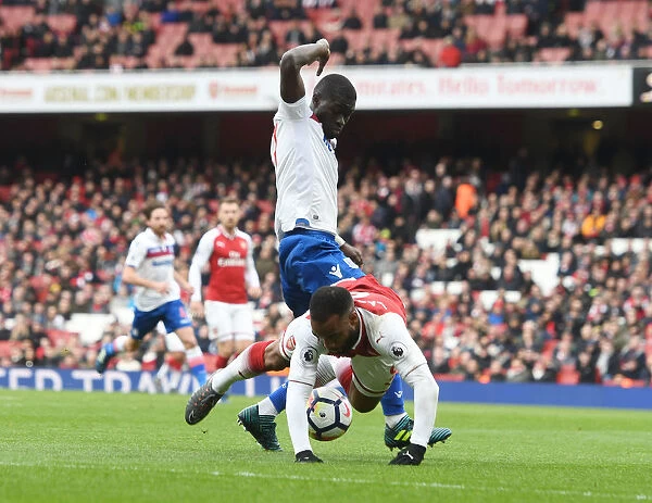 Controversial Penalty: Lacazette Tripped by Ndiaye in Arsenal's Win over Stoke City