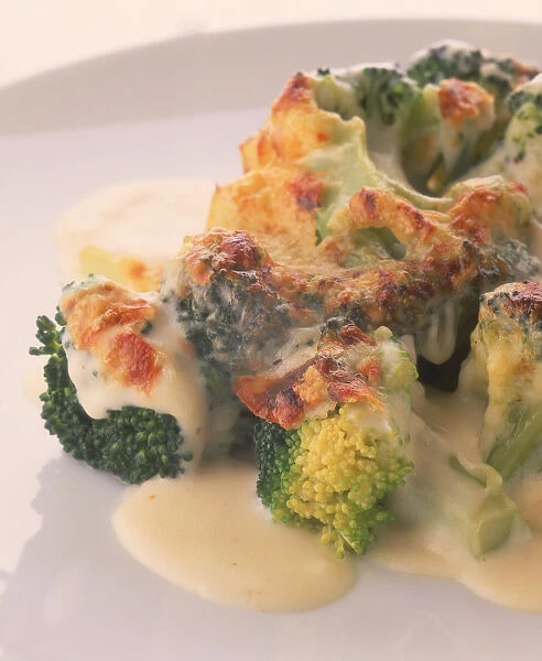 Broccoli in a cheese mornay sauce, lightly grilled to give a slightly crunchy, golden topping
