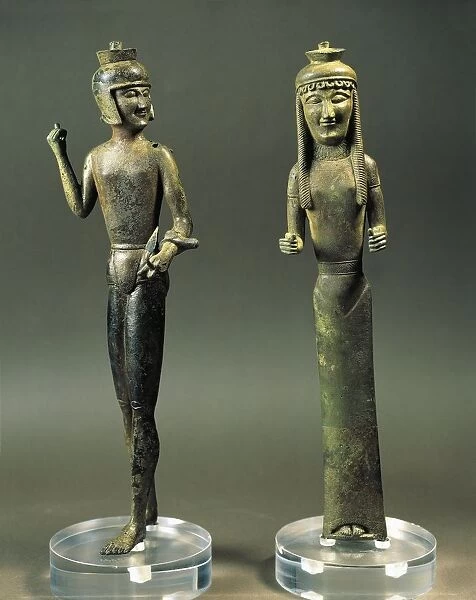 Bronze statuettes representing warrior and woman, possibly base for furniture, 550 B. C. from Brolio, Val di Chiana, Tuscany, Italy