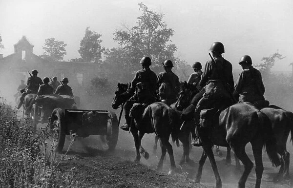 A horse-drawn artillery unit entering a village on the western bank of the don river, august 1942