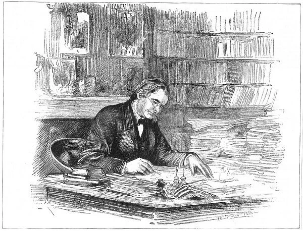 Thomas Henry Huxley (1825-1895) British biologist, at his desk in 1882 when President
