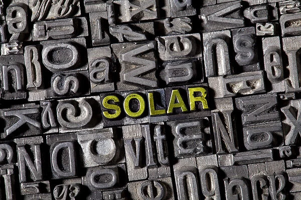 Old lead letters spelling the word SOLAR