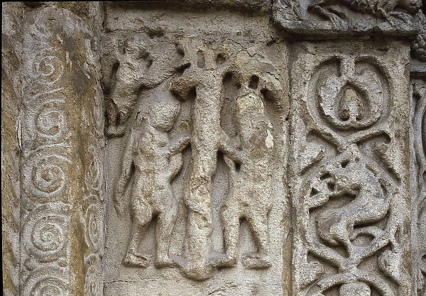 Adam and Eve. Detail of the facade of the Basilican, ealy 12th century (relief)