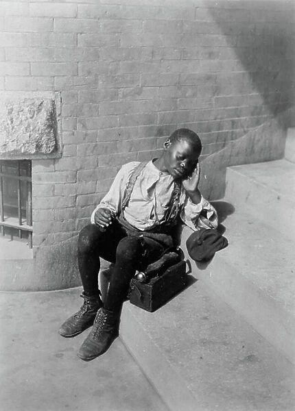 African American shoeshine boy, c. 1901 (b / w photo)