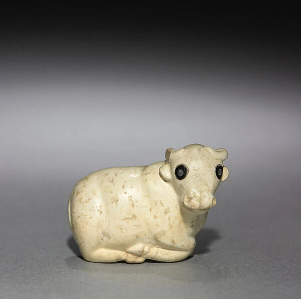 Amulet Seal in the Form of a Bull, c. 3250 BC (limestone with black stone inlaid eyes)