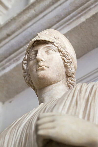 Ancient marble statue after the goddess Athena (marble)