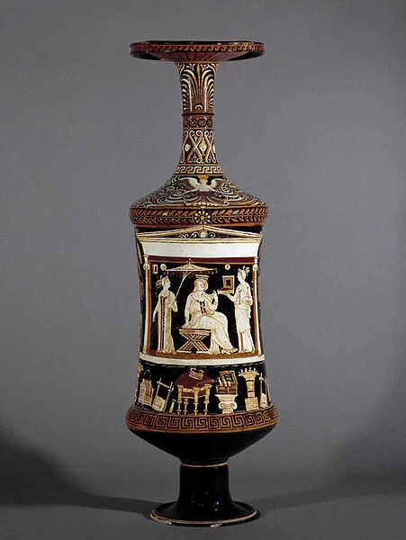 Apulian loutrophoros, inside a Naiskos with diadem, sits between two maids