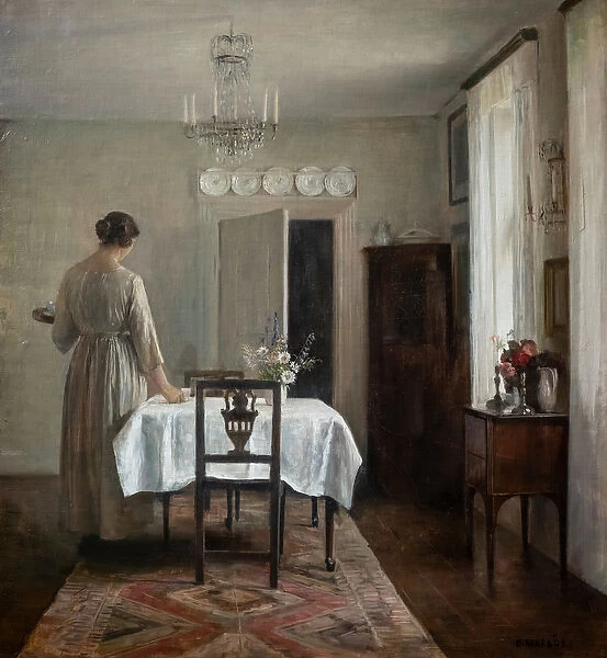 The artists wife setting the table, 1884-88 (oil on canvas)