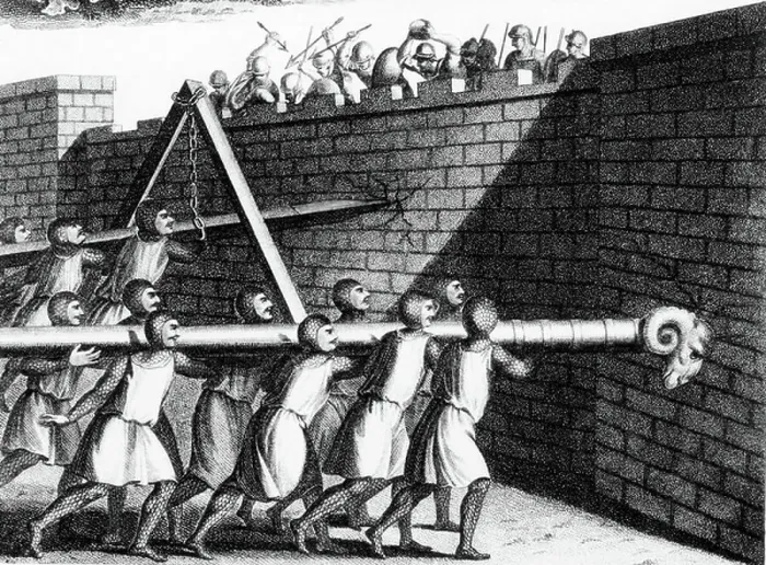 Framed Print : Attacking walls with battering rams. The one mounted on chains could be given more impetus than one carried on shoulders. Engraving c 1800 Framed Print : Attacking walls with battering rams. The one mounted on chains could be given more impetus than one carried on shoulders. Engraving c 1800