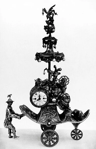 Automaton in the form of a chariot pushed by a Chinese attendant and set with a clock