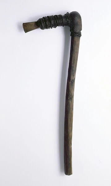 Axe found with the Oetzi Iceman (yew wood with leather binding) (see 222117 for detail)