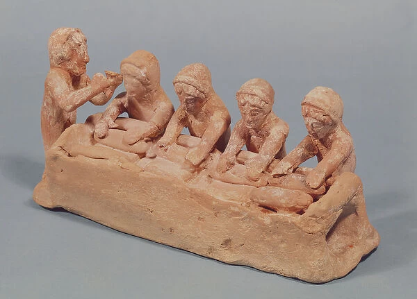 Bakers kneading dough to the sound of a flute, found at Thebes, Boeotia, 6th century BC