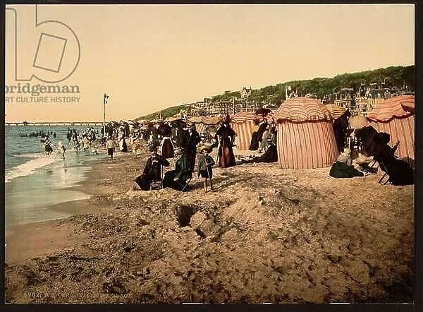 The beach at bathing time, Trouville-sur-Mer, France, c. 1905 (colourised photo)