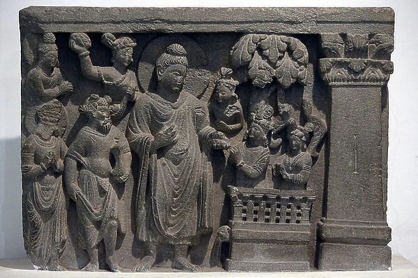 Buddha with Naga-Kalika. Gandhara, 2nd century A.D ( Stone)