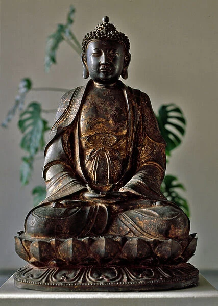 Buddha seated in lotus during meditation (sculpture)