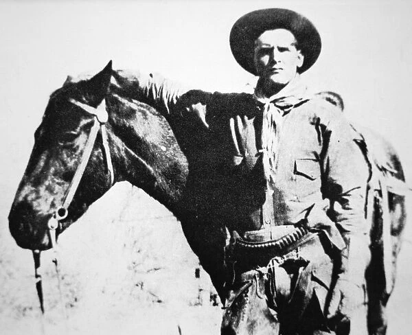 Butch Cassidy (1866-1908  /  09) with his horse (b  /  w photo)