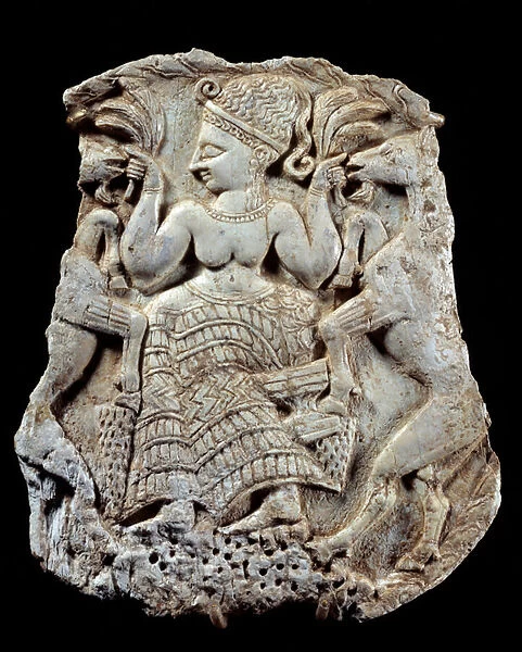 Carved ivory lid: Mycenian goddess of fecondite as animal master