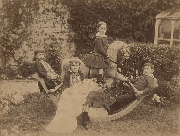 Children on rocking horse, c. 1890 (b  /  w photo)