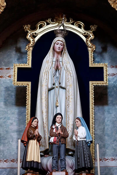 Church of Mercy. Our Lady of Fatima with Lucia dos Santos and her cousins Francisco