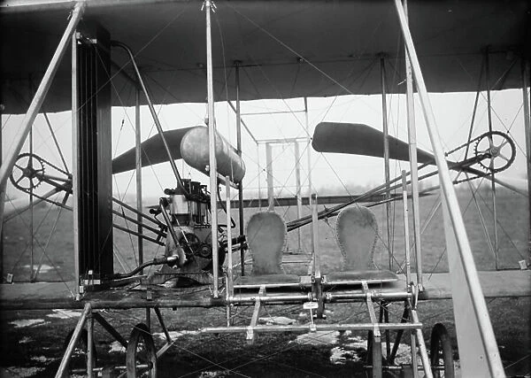 Close-up view of airplane, including the pilot and passenger seats, 1911 (photo)