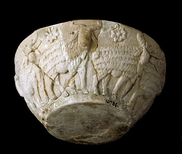 Cup with reliefs of rams, 3000 BC (carved limestone)