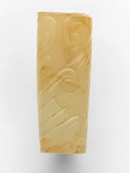 Cyclindrical bead, c. 800-700 BC (jade)
