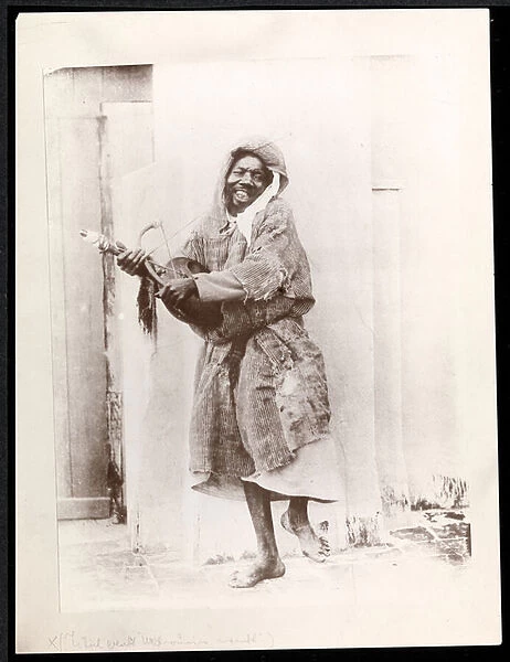Dancing musician, c. 1900 (silver gelatin print)