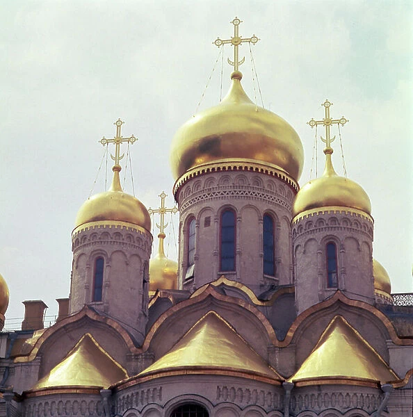Detail of the East facade showing the gilded domes, 1484-89 (photo)