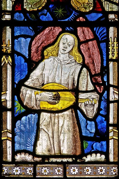 The East window (Ew) depicting a musician angel with lute (stained glass)