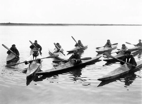 Eskimos in kayaks, c. 1920 (b  /  w photo)