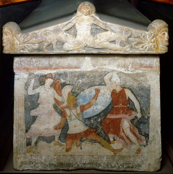Etruscan art: 'a Greek soldier is attacked by two Amazons'Above, Acteon devore by his dogs. Amazon sarcophagus. End of the 4th century BC. From Tarquinia. Florence, Museo Archeologico