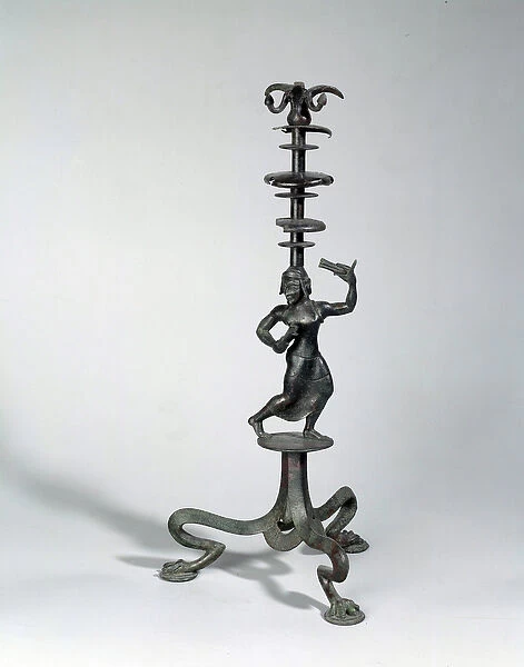 Etruscan art: bronze candelabre representing a rattlesnake dancer. 5th century BC