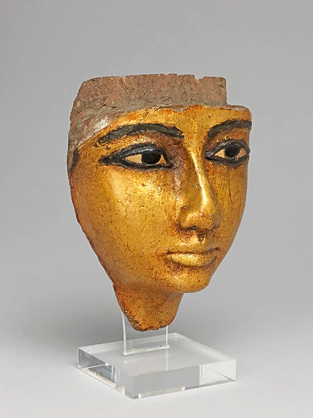 Face from a coffin, with eyes and eyebrows inlaid, gilded, 1186-1069 B. C